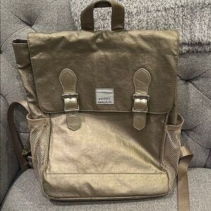 Perry Mackin gold backpack